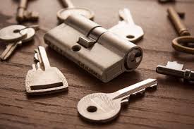 Keys and lock cylinder on a workbench