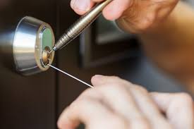 Lock being picked on a door